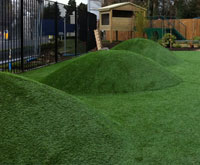 Artificial grass mounds