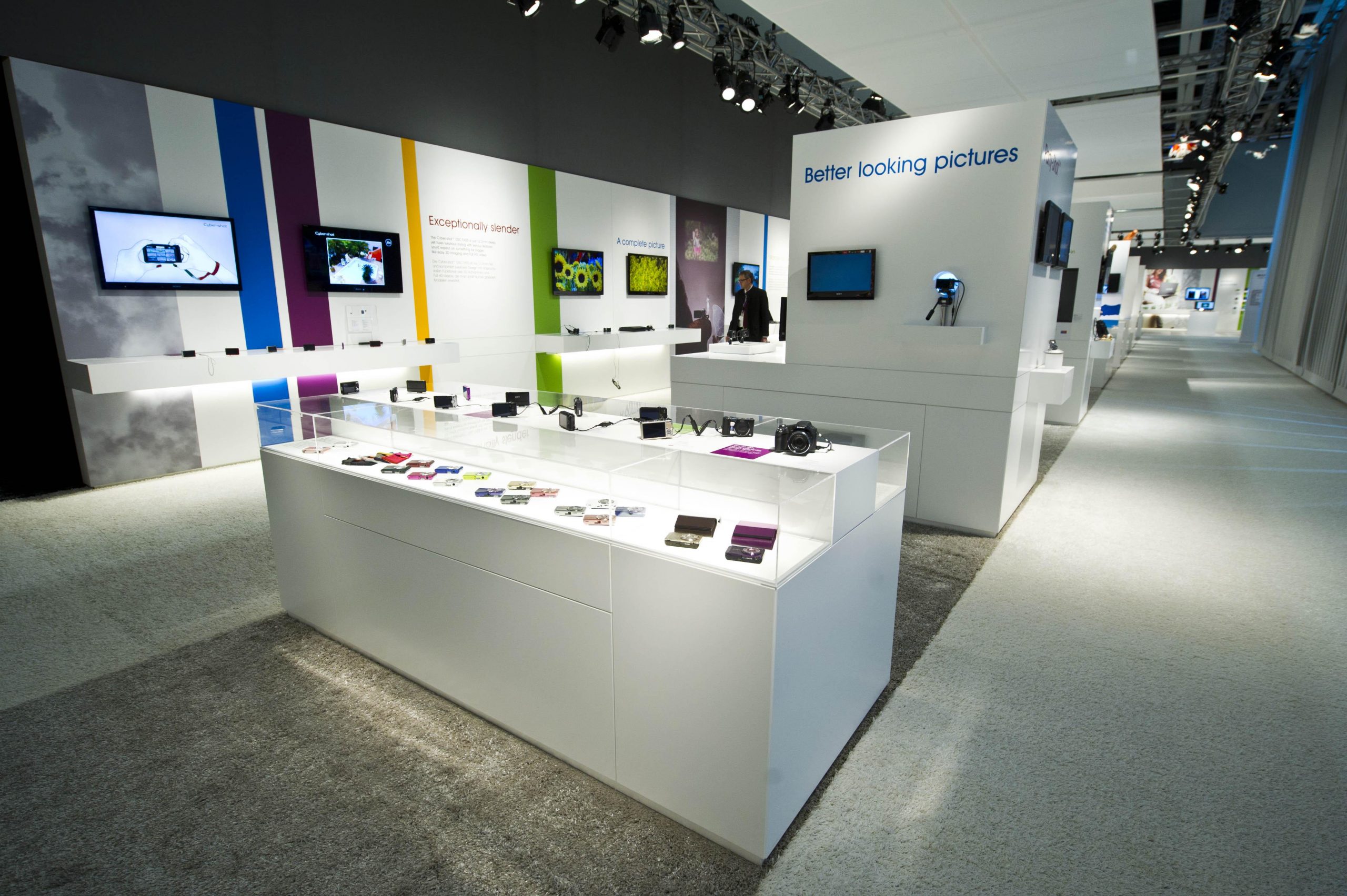 Grey artificial grass beneath product displays at a Sony exhibition stand