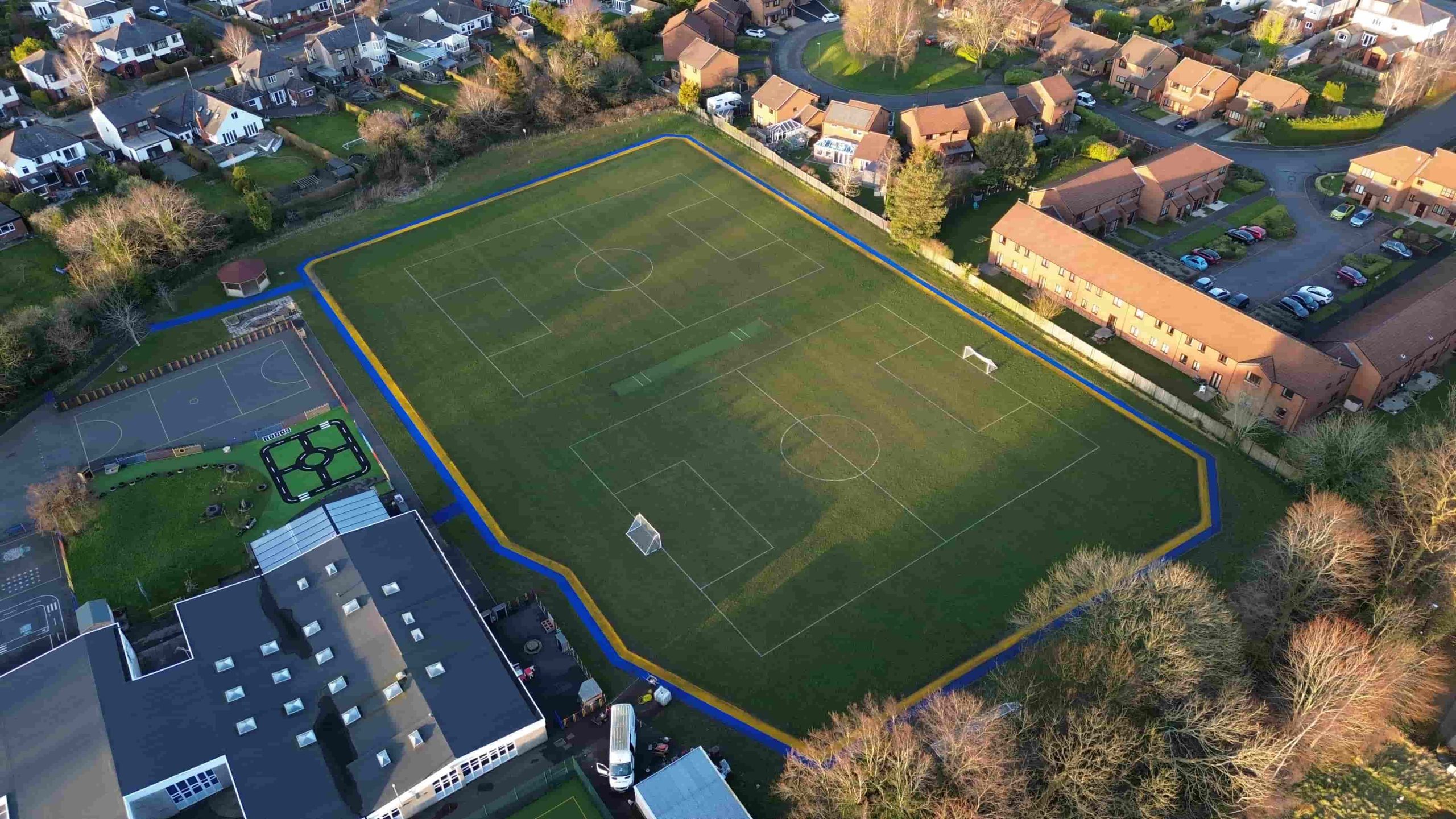 Artificial grass Daily Mile track around the field at Fulwood Primary School