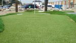 As Good As Grass team installation showing clean groundwork and turf placement.