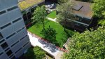 Top-down aerial image of artificial grass installation at a Didsbury school