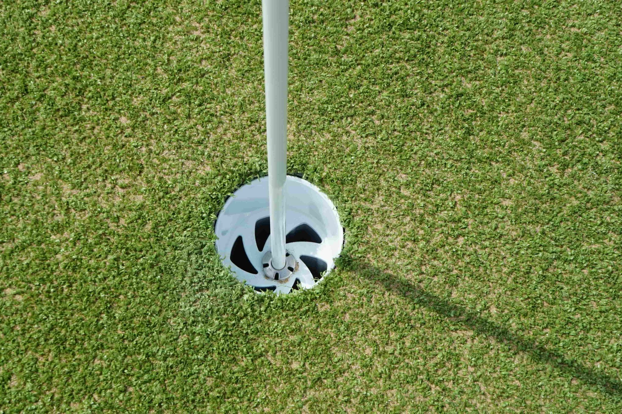 As Good As Grass installation showing a putting lane with precise cuts and professional finish.