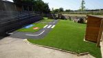 Bespoke roadway-style play track with curves and traffic symbols for pupils