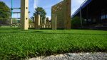 Artificial grass installed around school climbing frames at Nordon Primary School to create a safe and engaging play area